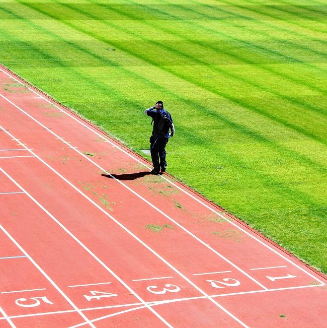 person walking in grass field -gysUcHlbV9A-unsplas_hmax-williams_650